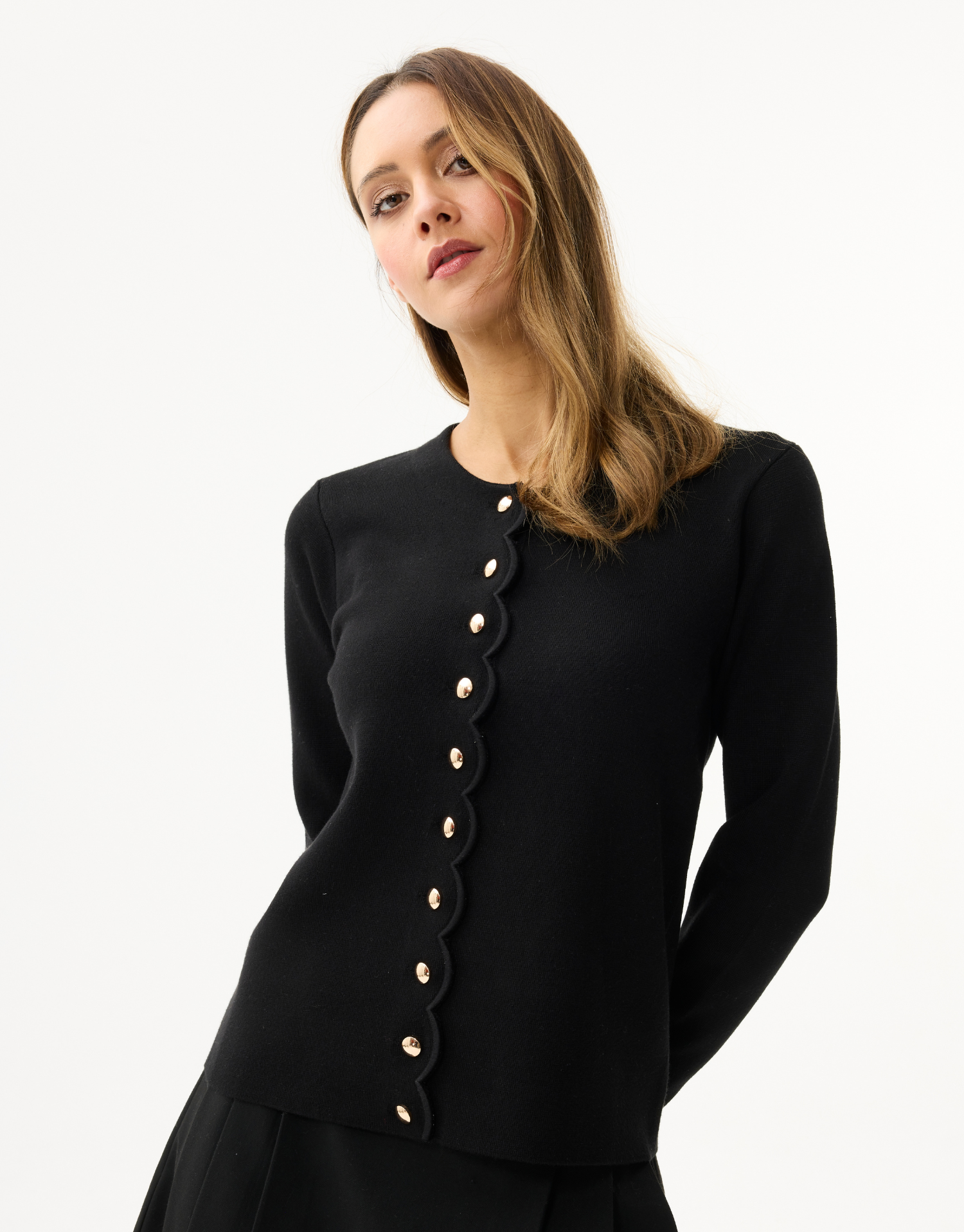 Damesvest met knopen en festonranddetails