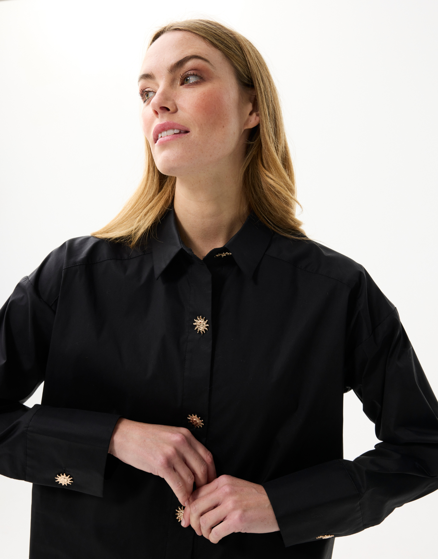 Damesblouse met sierknopen