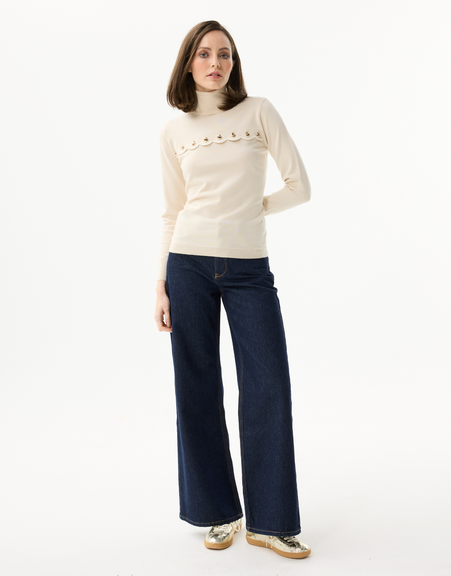 Women's turtleneck sweater with scalloped details and golden buttons