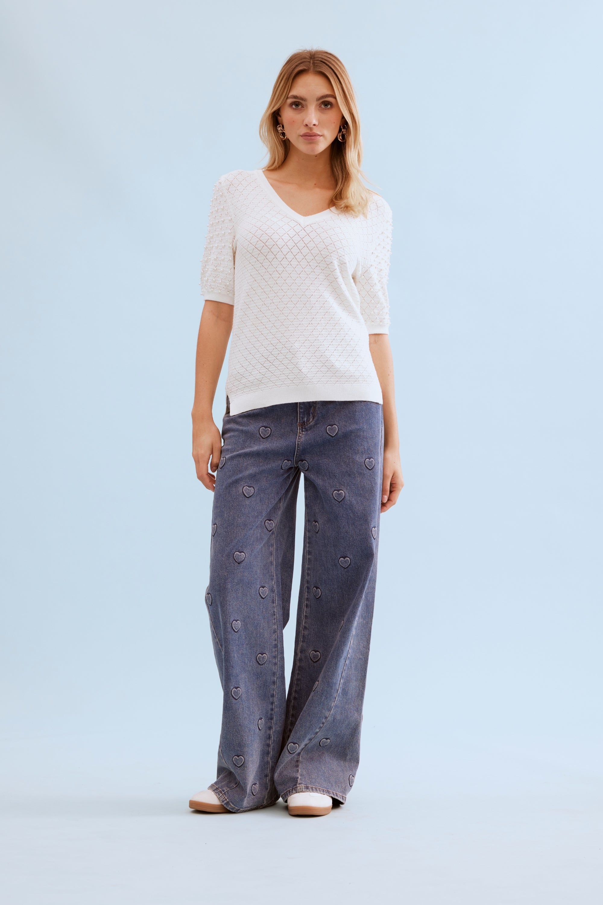 Pull maille ajourée perlée