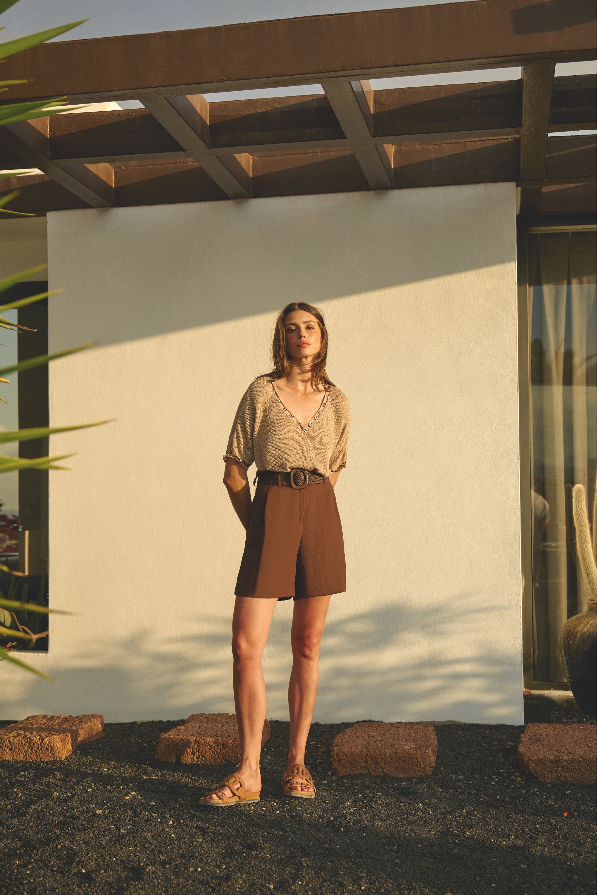 Top maille beige à détails coquillages