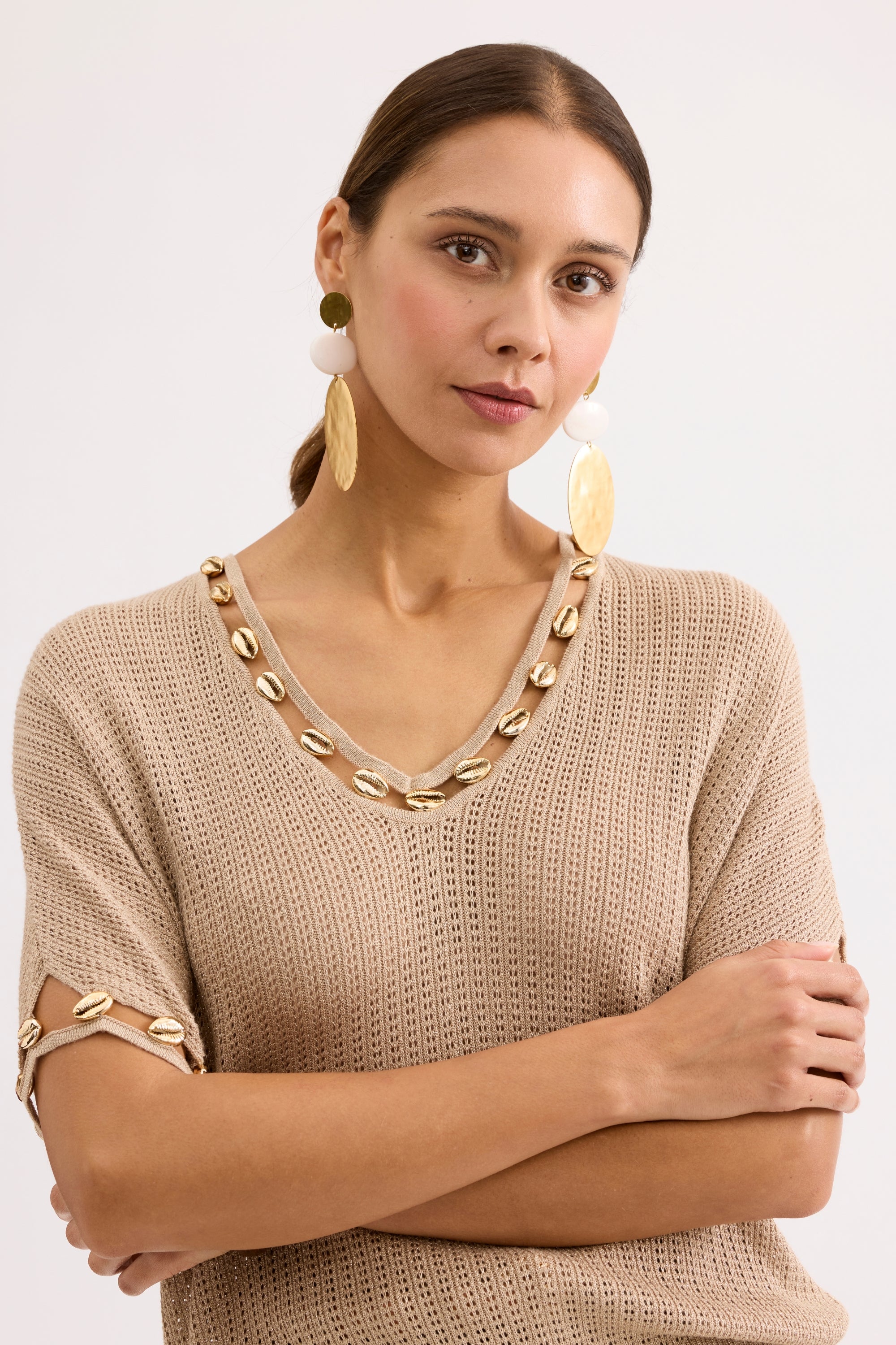 Top maille beige à détails coquillages
