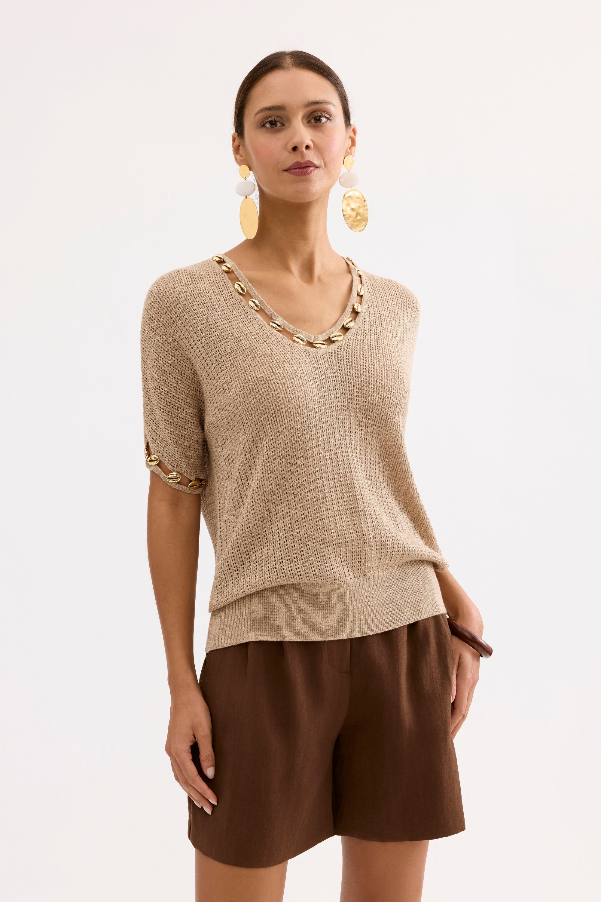 Top maille beige à détails coquillages