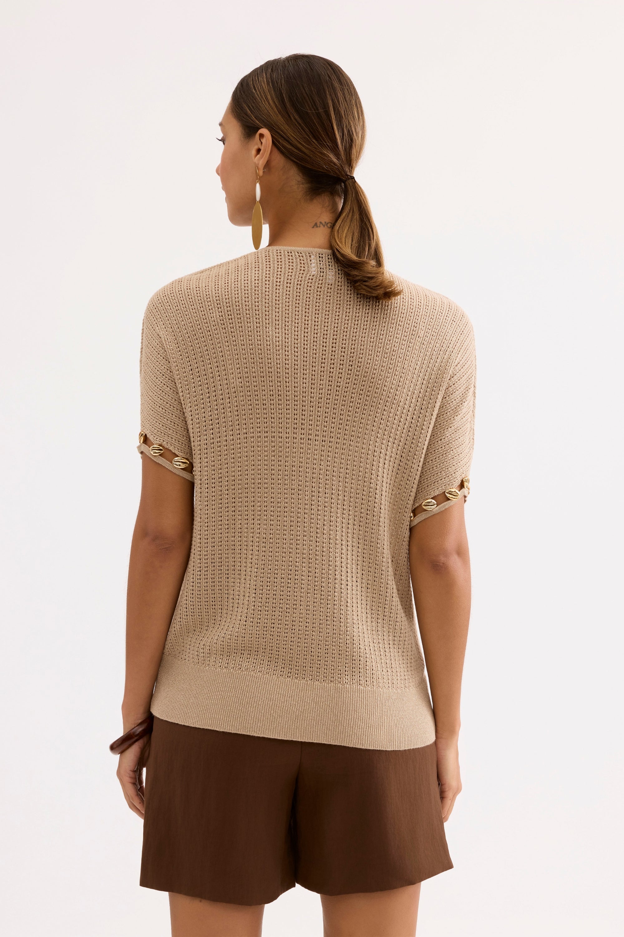 Top maille beige à détails coquillages