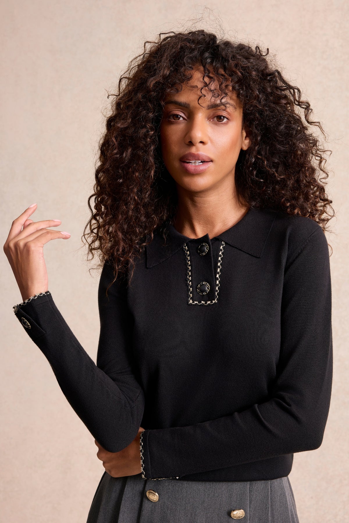Pull col polo à boutons bijoux