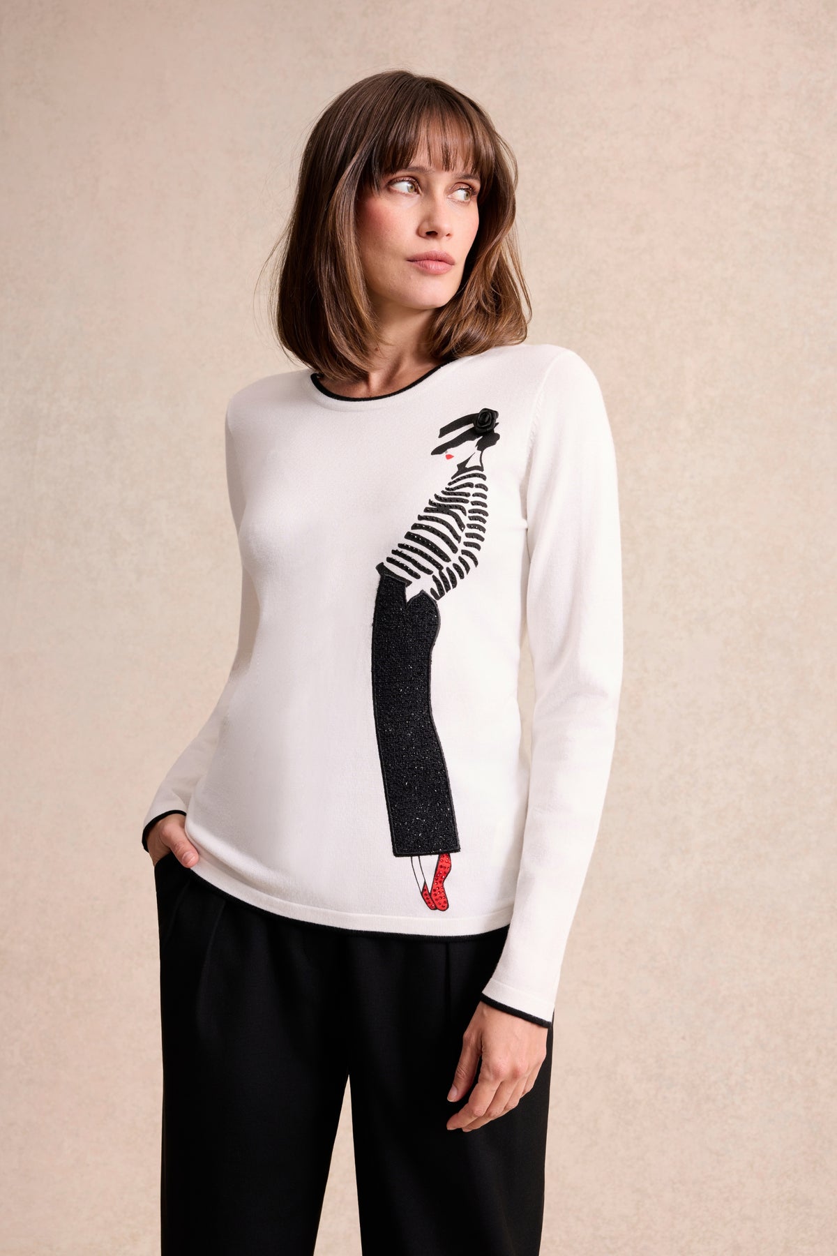 Pull à motif femme parisienne