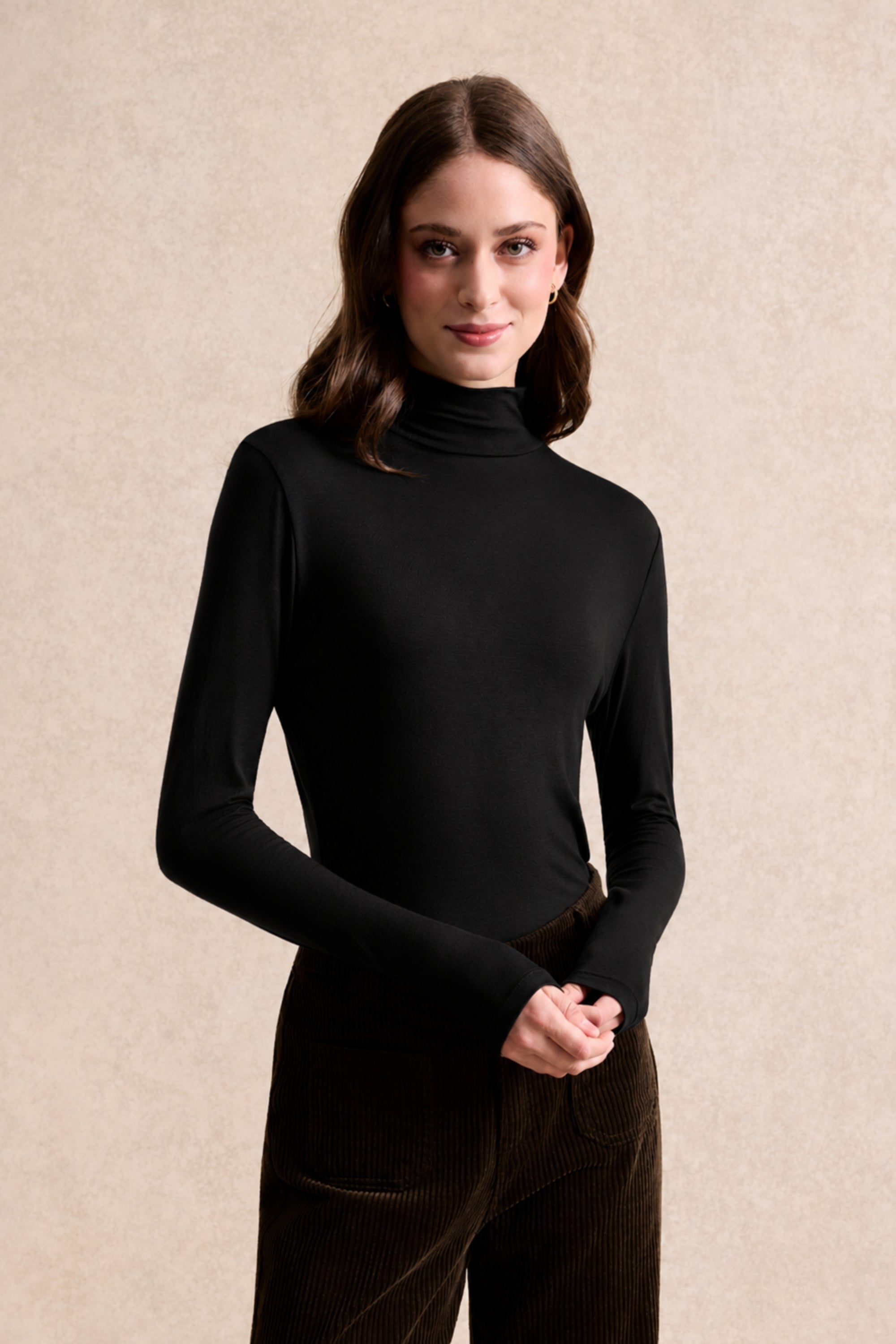 Top col roulé en maille fine noir