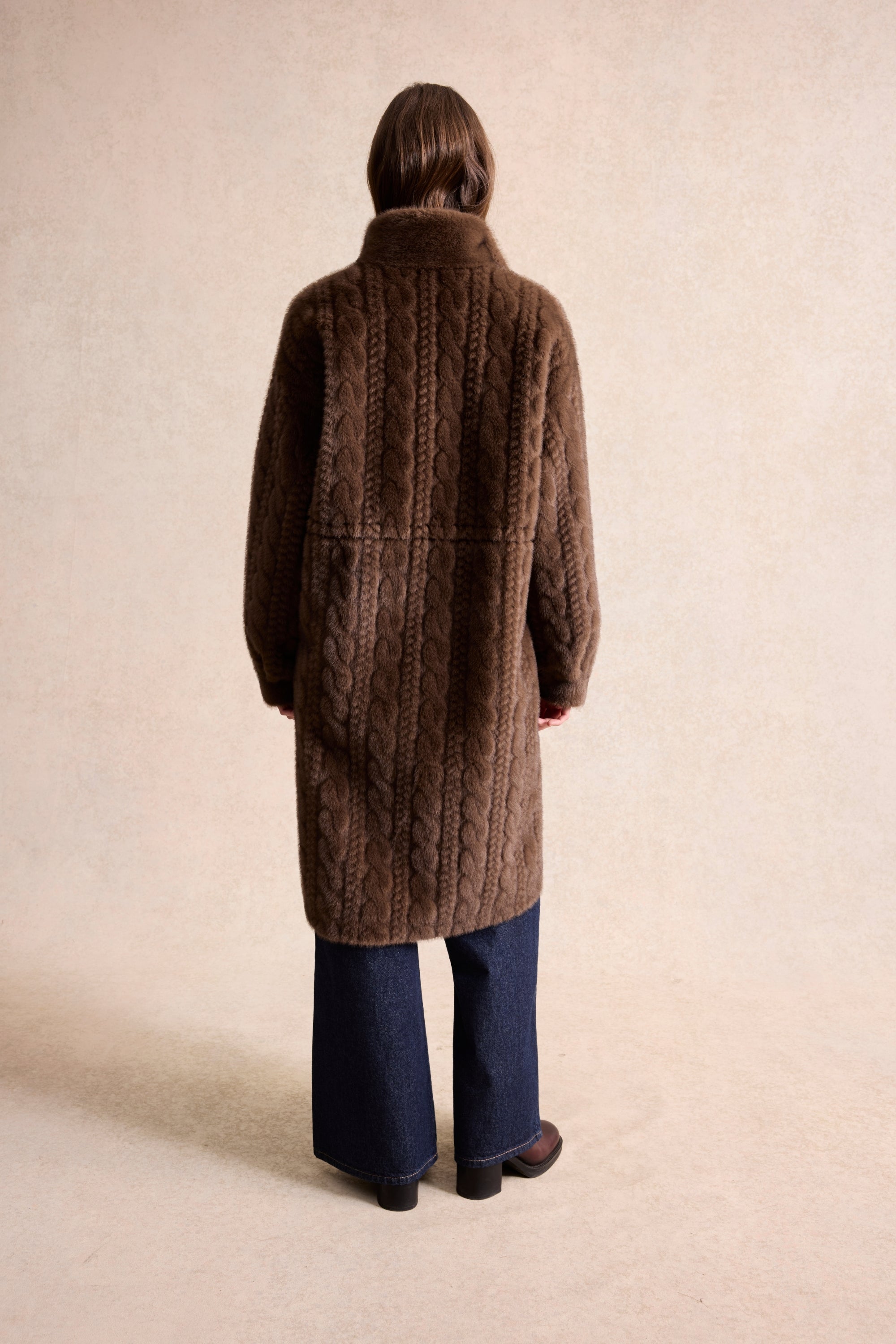 Manteau fausse fourrure à fermeture zipée