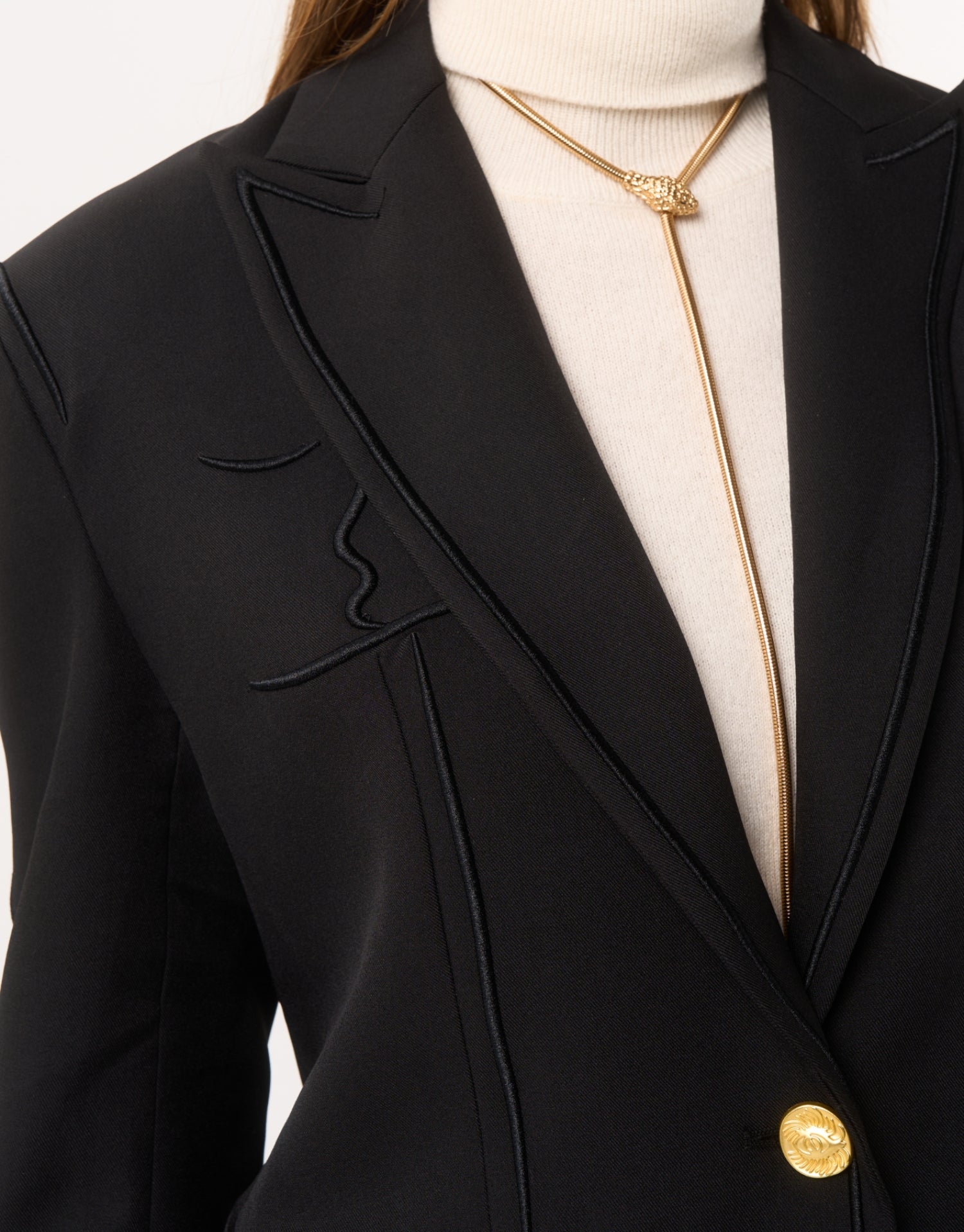 Blazer noir structuré à bouton doré