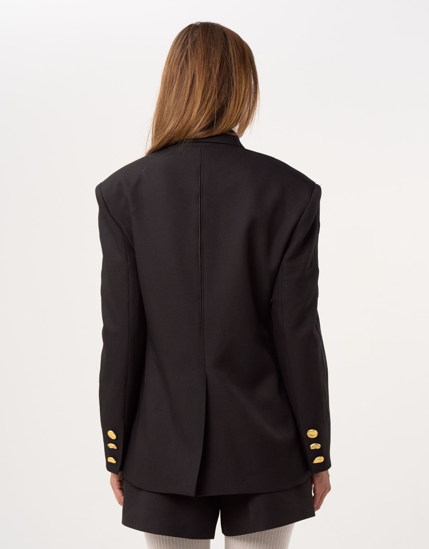 Blazer noir structuré à bouton doré