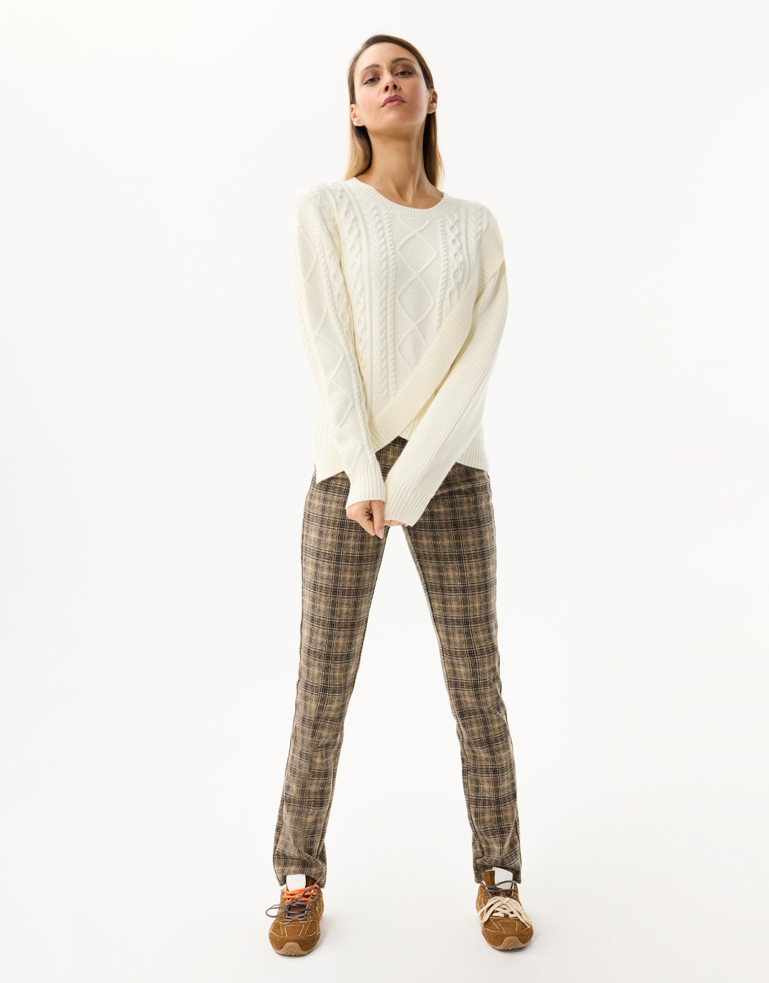 Twisted sweater with asymmetrical details