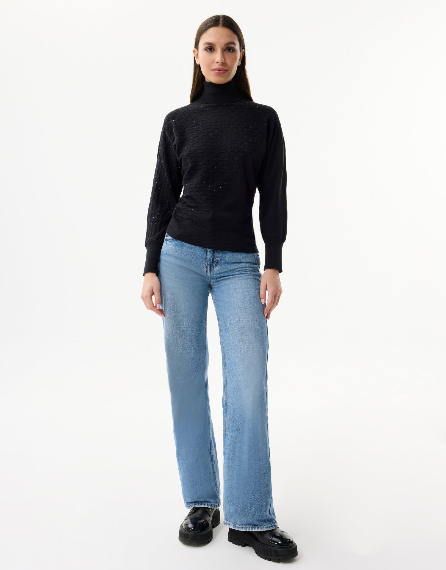 Pull col roulé en maille noir