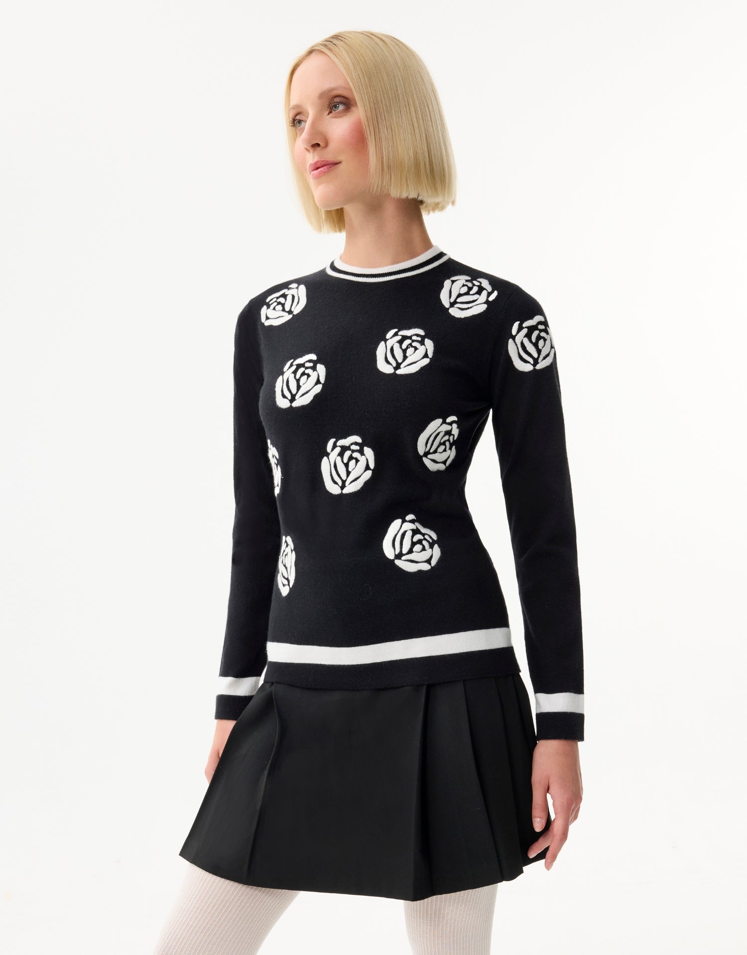 Pull à motif roses contrastées noir