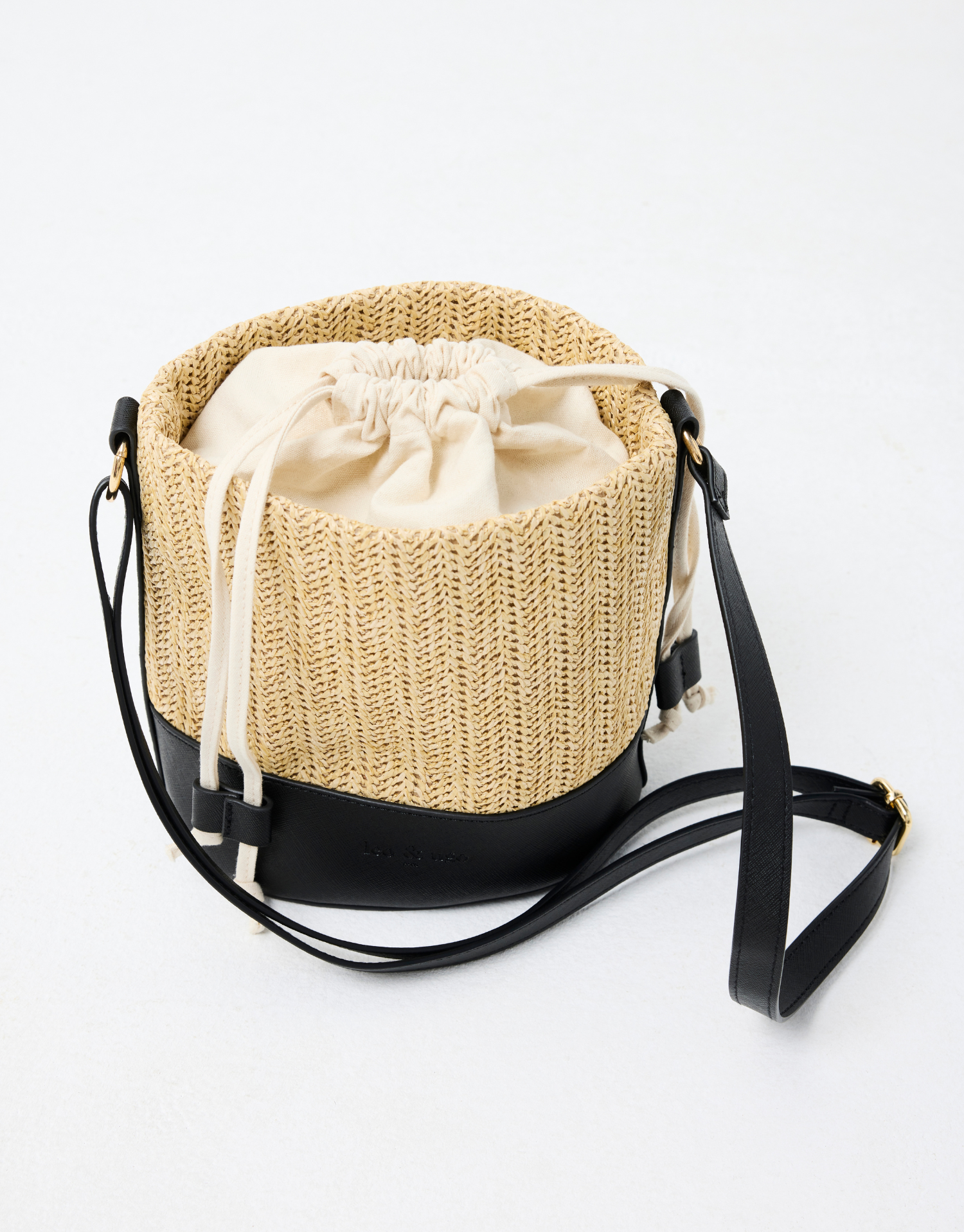 Sac Pauline en leer en gevlochten zeegras armband