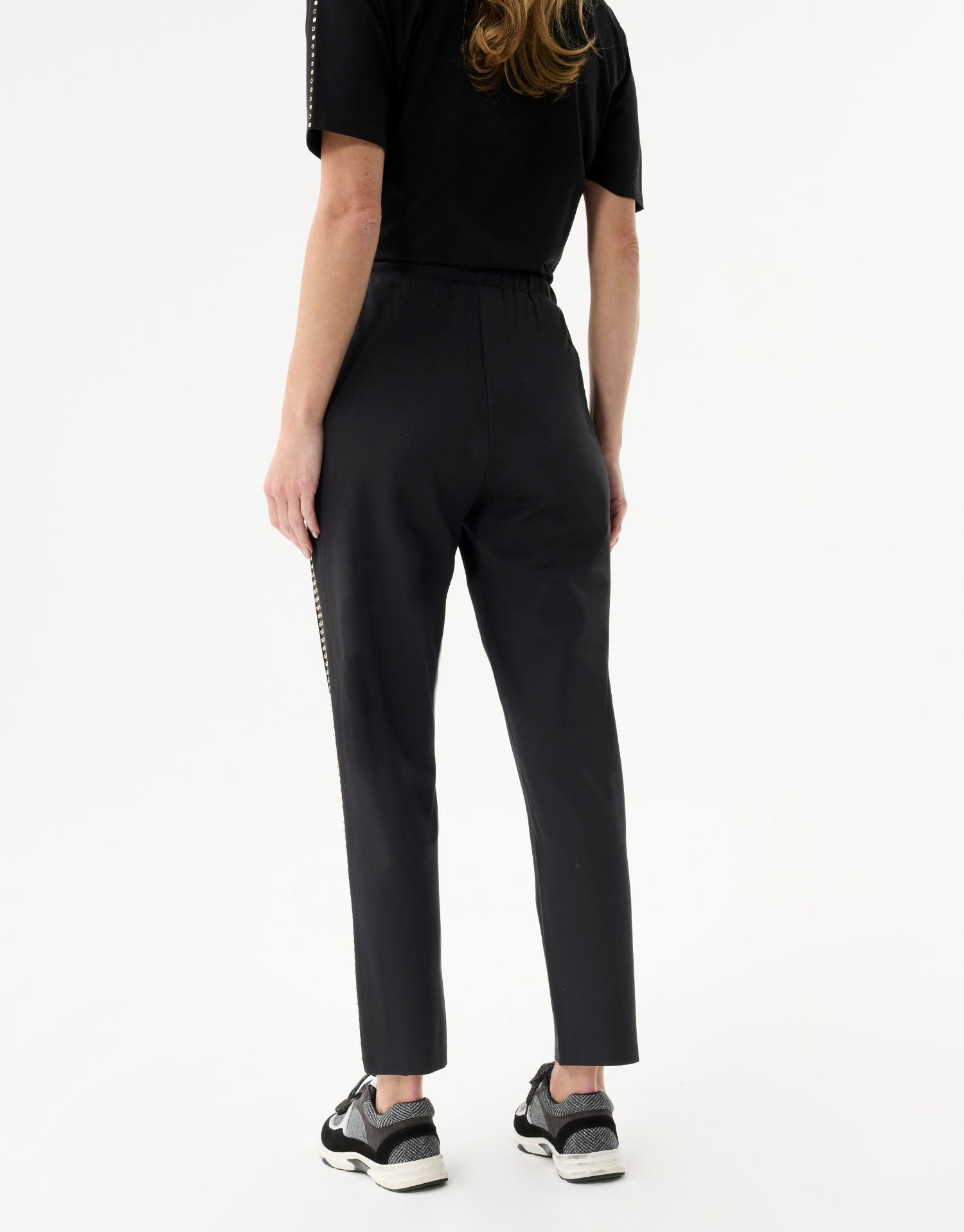 Zwarte broek met oogjes