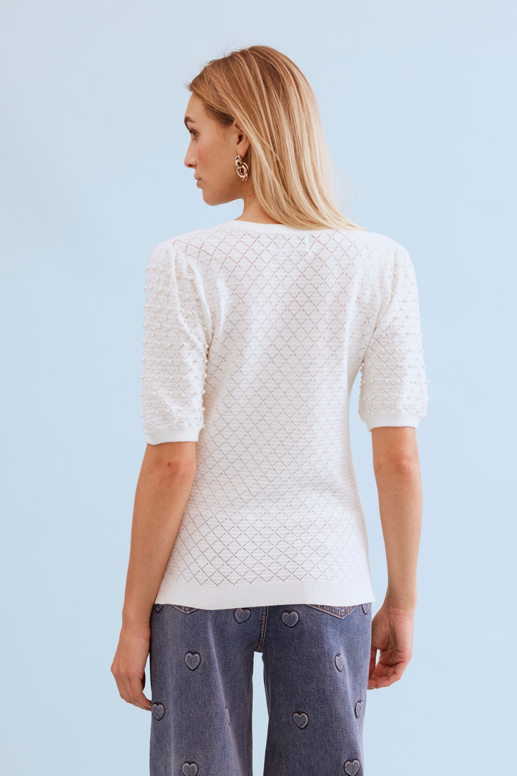 Pull maille ajourée perlée