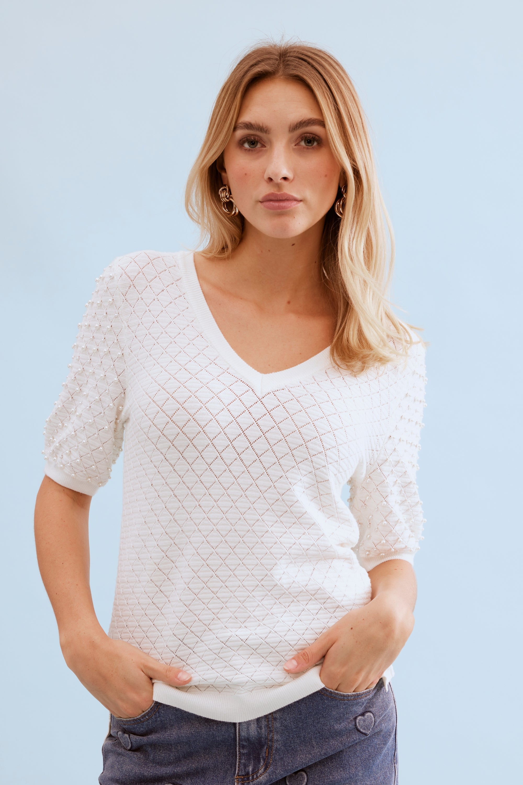 Pull maille ajourée perlée