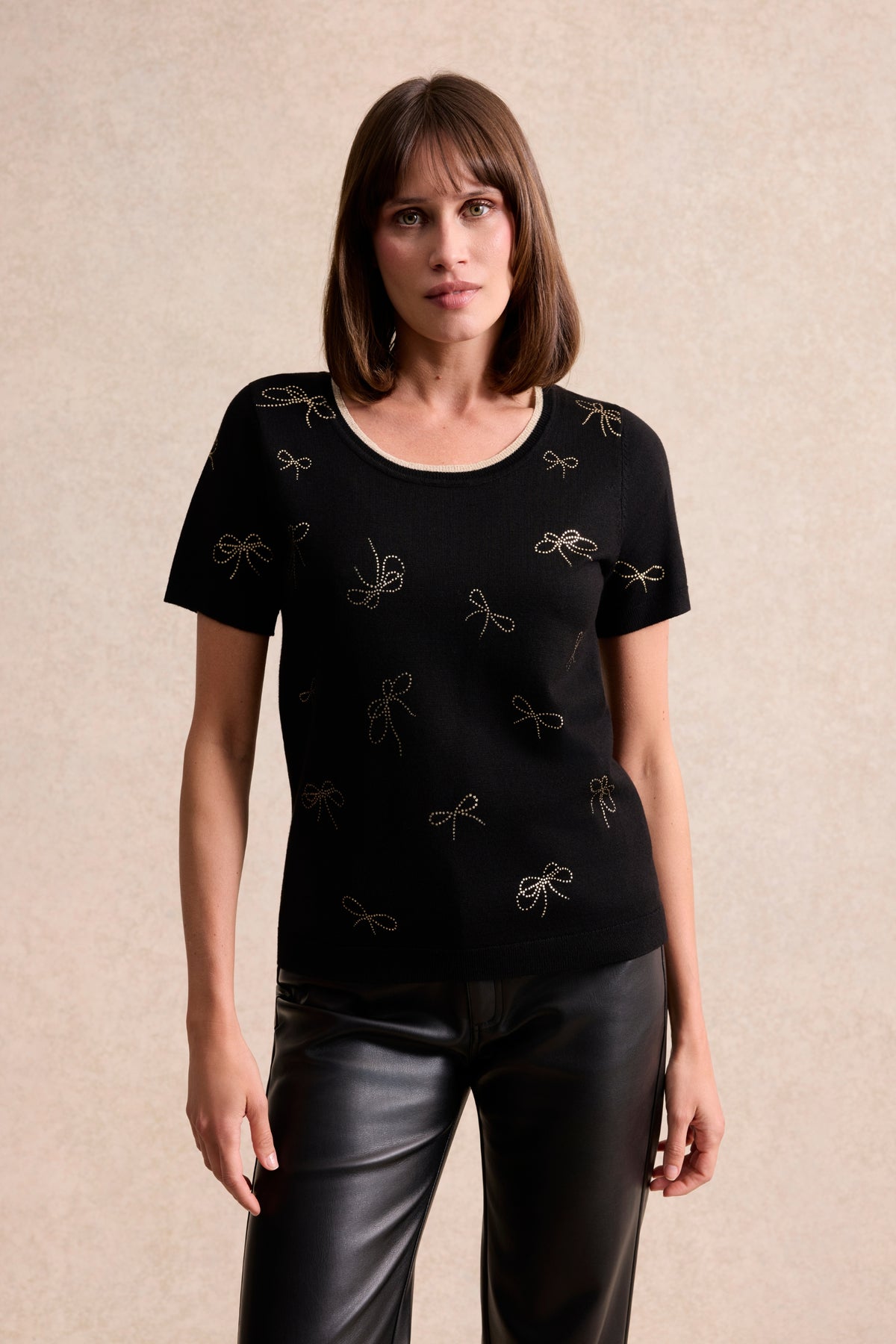 Twin-set à motifs nœuds dorés noir