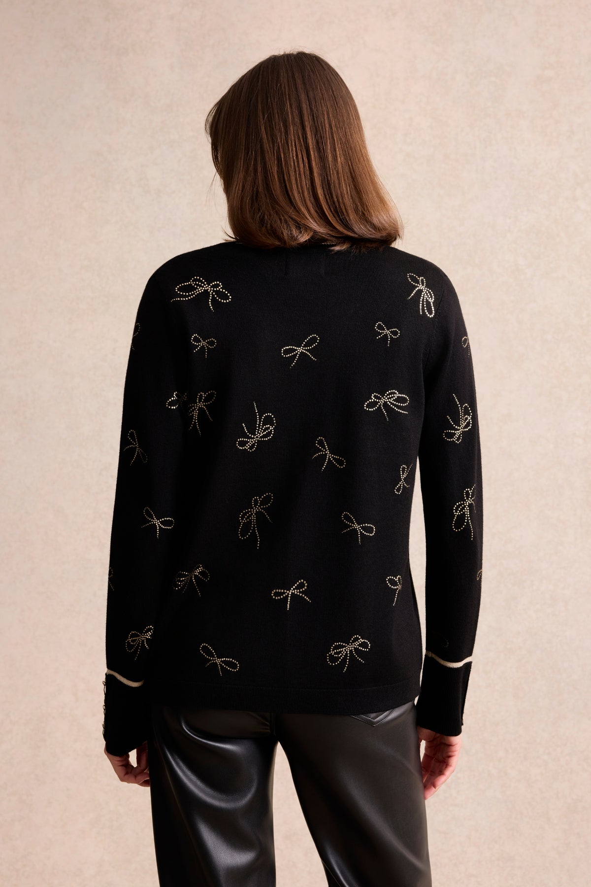 Twin-set à motifs nœuds dorés noir