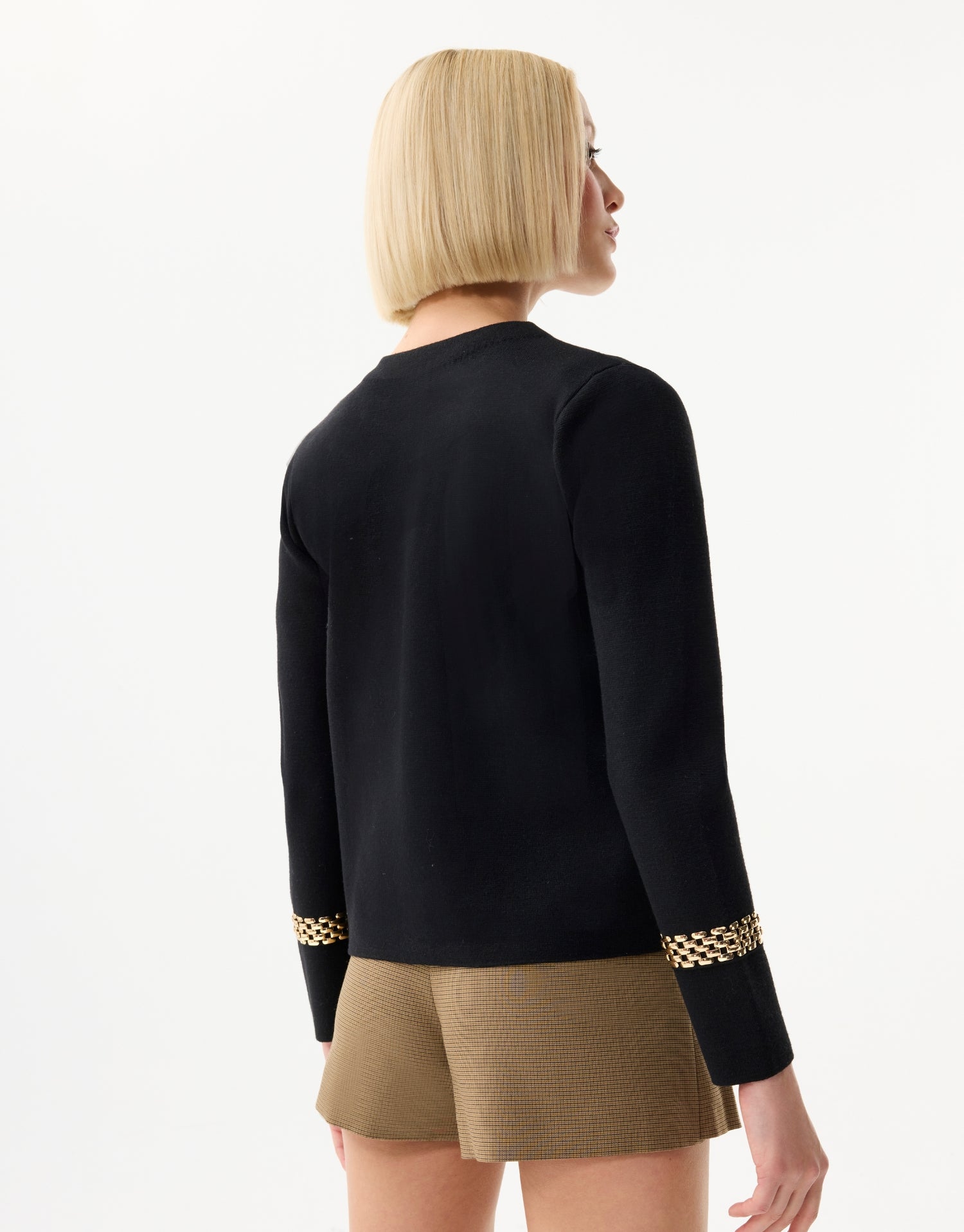 Twin-set noir à détails dorés