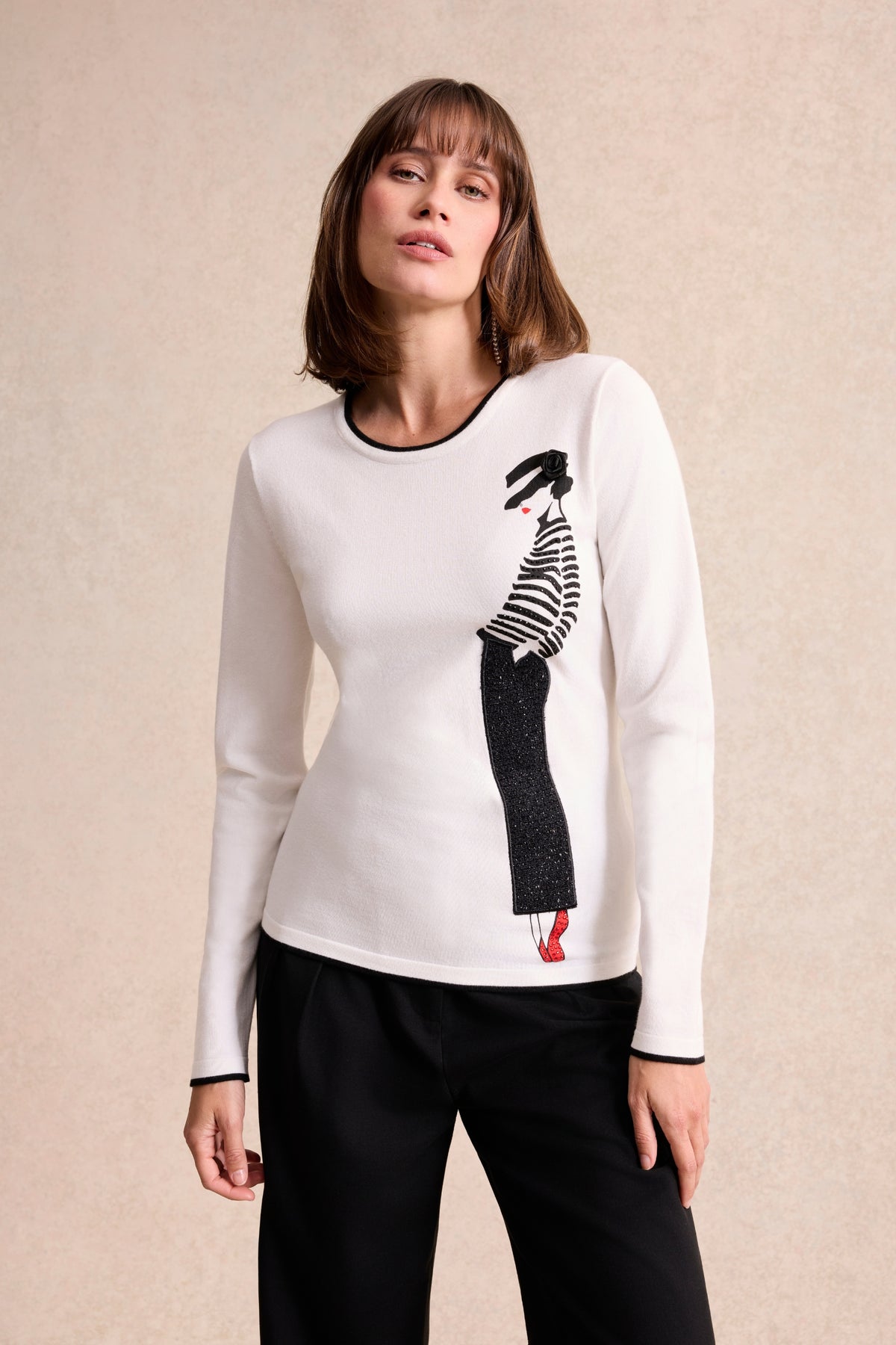 Pull à motif femme parisienne