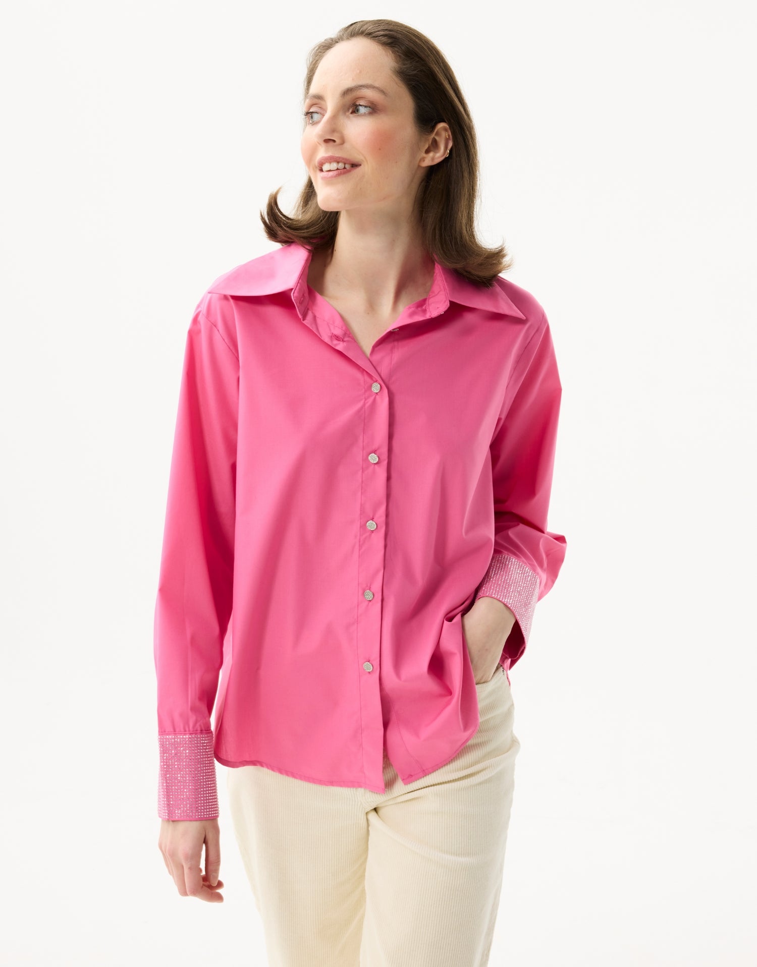 Chemise fuchsia à poignets strass