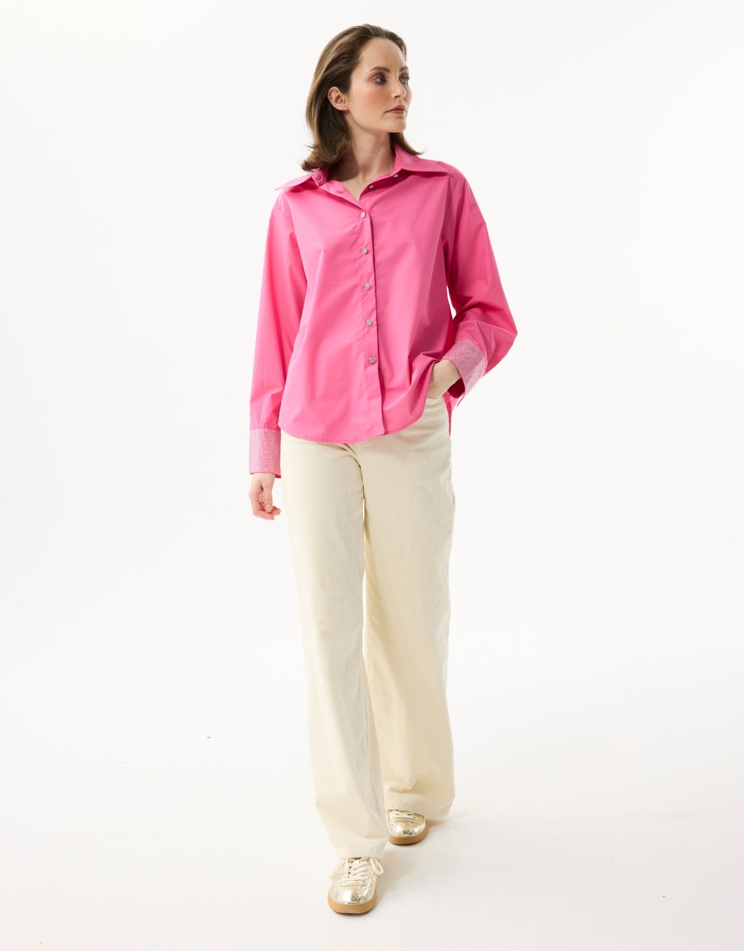 Chemise fuchsia à poignets strass