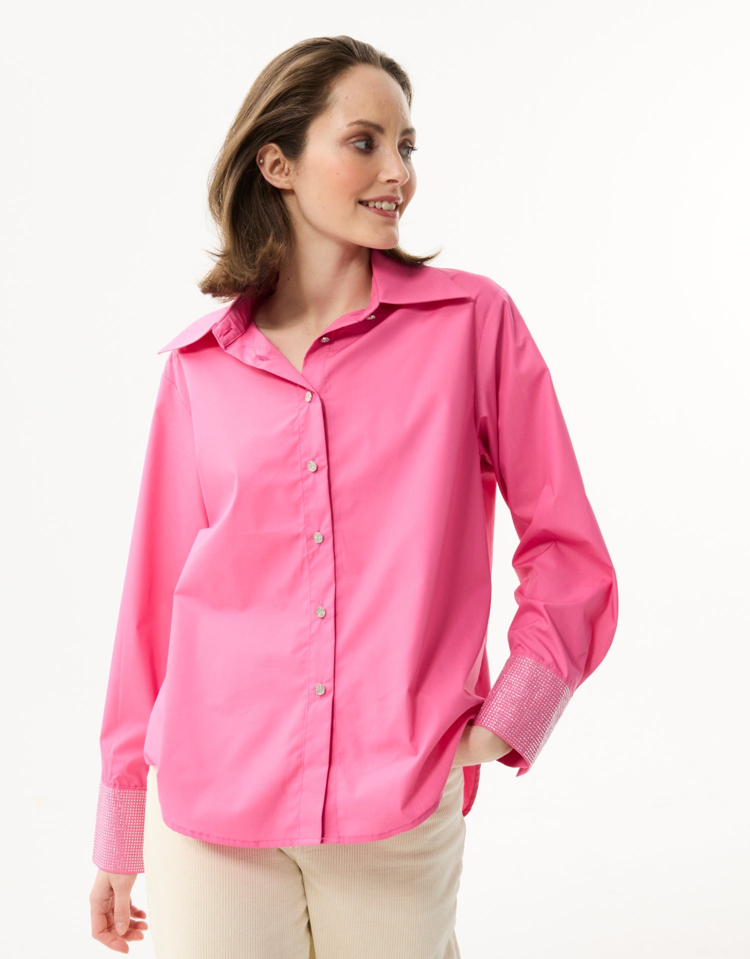 Chemise fuchsia à poignets strass
