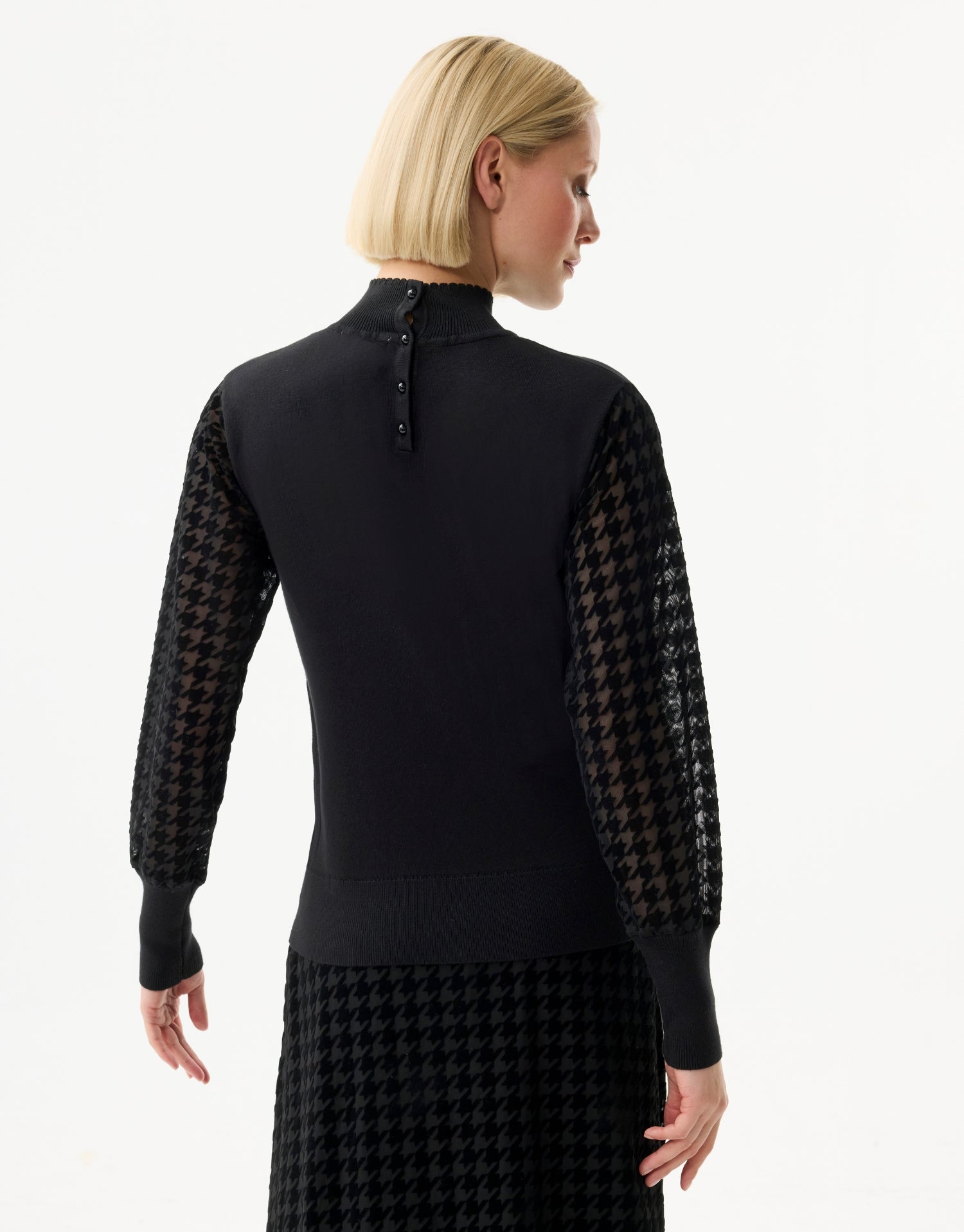 Trui met voile mouwen en pied-de-poule patroon