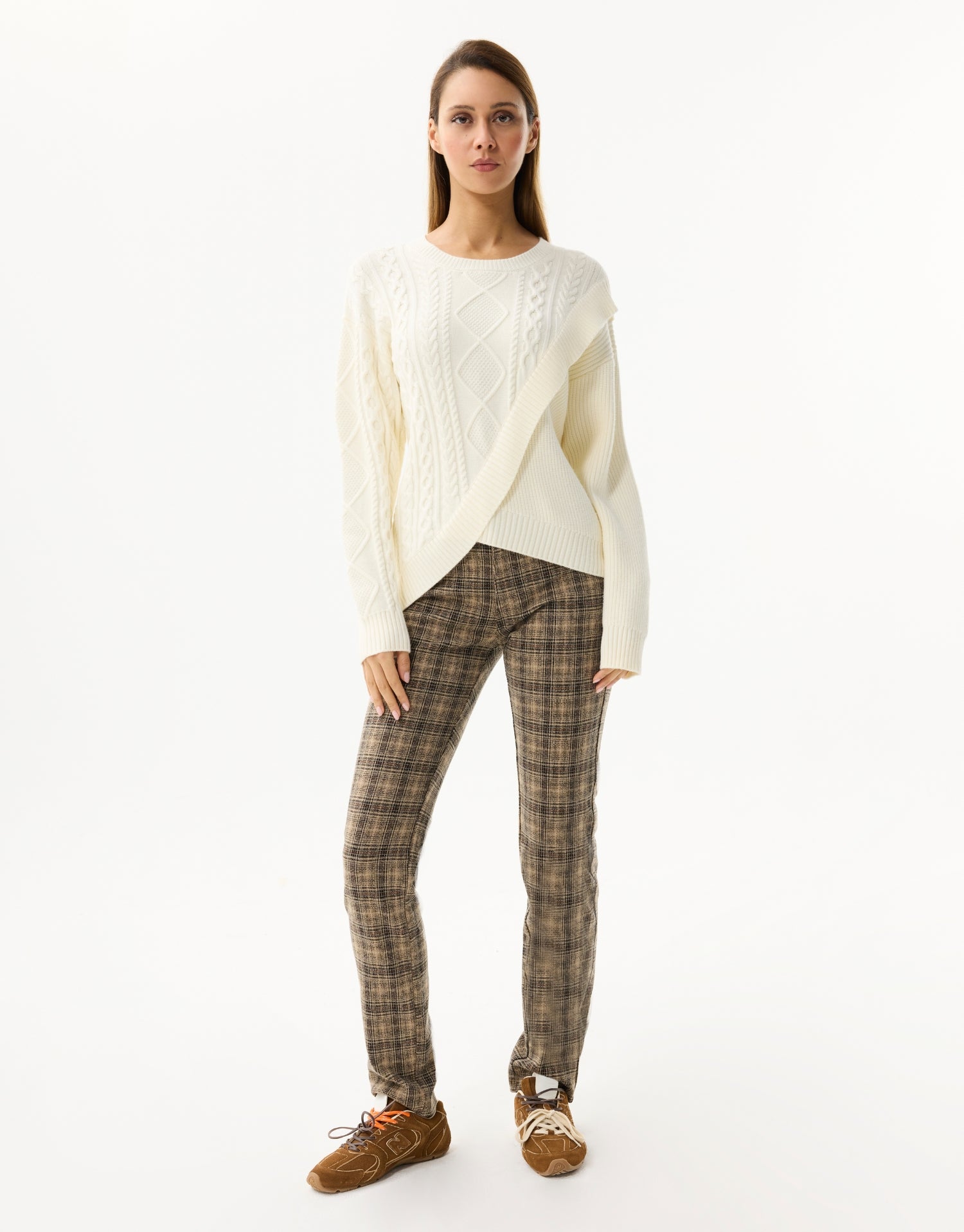 Twisted sweater with asymmetrical details