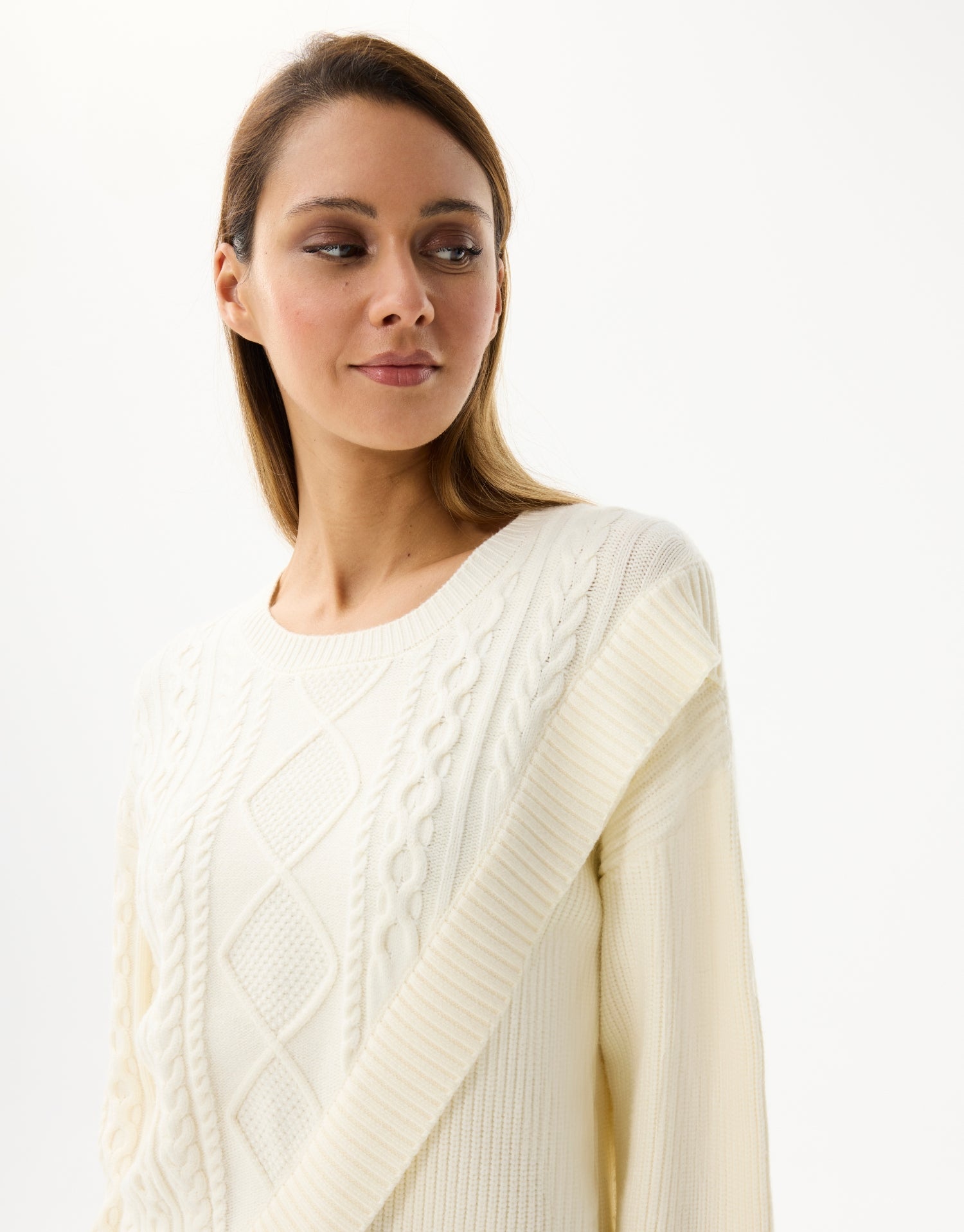 Twisted sweater with asymmetrical details