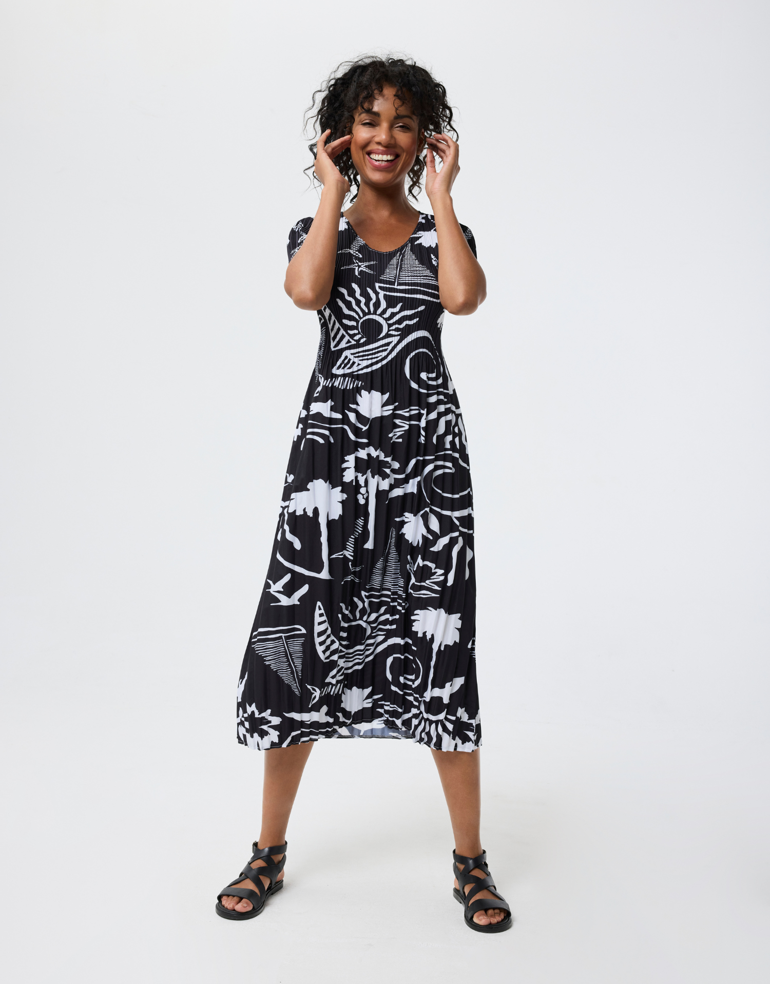 Black and white pleated midi dress